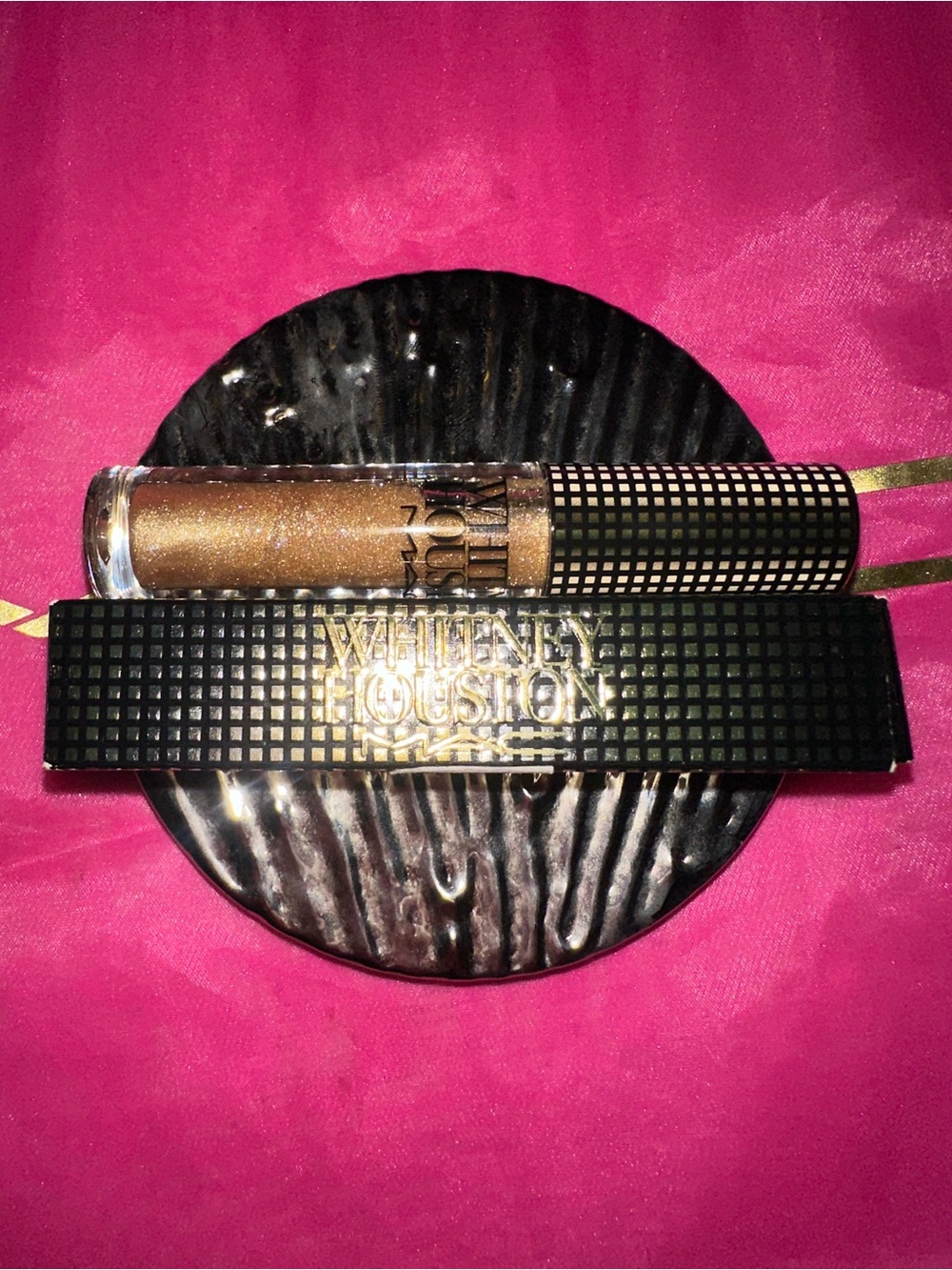 MAC Nippy’s Shimmery Gold Lipglass